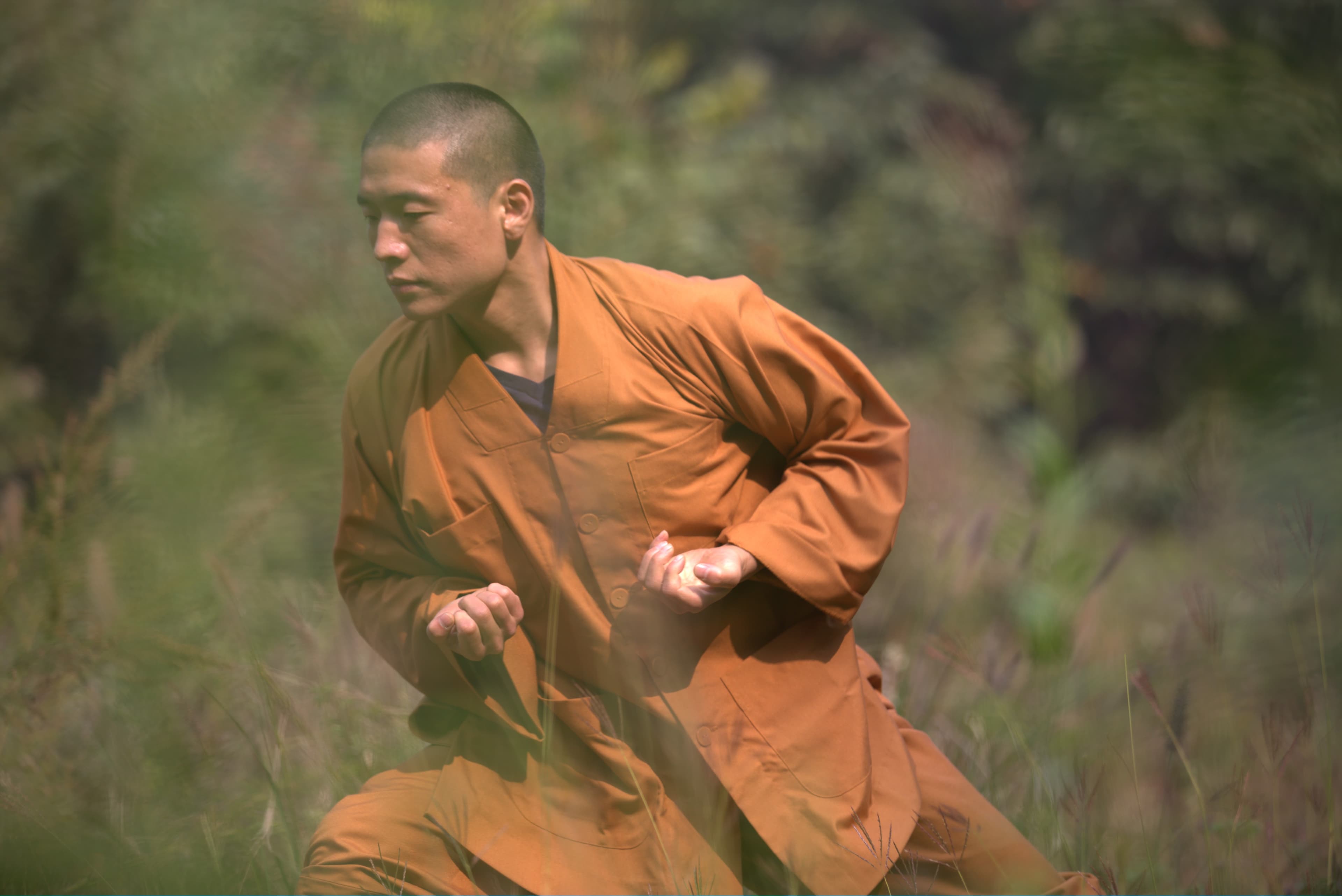 Master Zhu in Shaolin robes, fighting stance